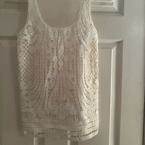 Unworn white tank top.